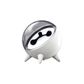 White and silver speaker with a black design on a white background