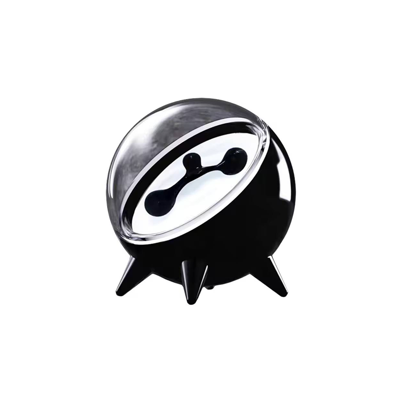 Black and silver speaker with a black design on a white background
